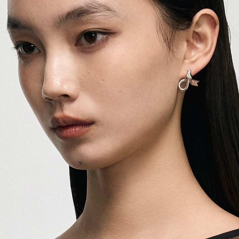 Entwined Arrow Stud Earrings - Image 4